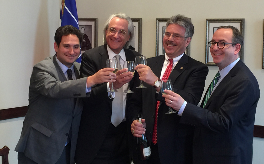 Zac Kline, ’12 (Law), Tom Kline, Duquesne President Ken Gormley, Dan Filler toast to celebrate the path-breaking announcement.