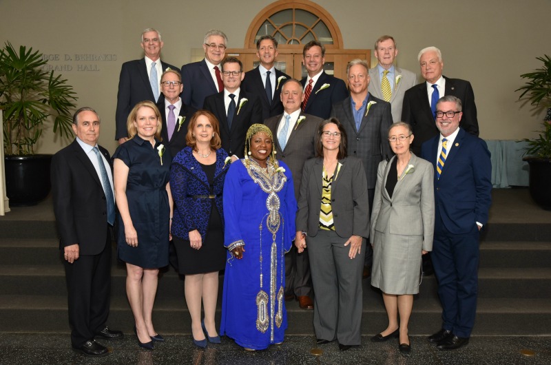 The 14 members of the 2017 class of the Drexel 100 pictured with other Dragons at the ceremony. Top row, left to right: Joseph Grimes; Leonid Hrebien; Richard A. Rose, Jr.; Alfred Altomari; and Thomas Matthews. Middle row: Henri Levit; Clifford Hudis; Craig Sabatino; Michael Baum; and Chair of the Board of Trustees Richard A. Greenawalt. Bottom row: Chair of the Drexel 100 David R. Geltzer; Christine McKendry Andrade; Kathleen Chimicles; Rita K. Adeniran; Lisa Anne Forsyth; Libby Fleisher Wilson; and President John Fry. 