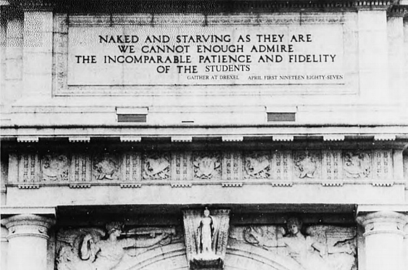 This image from The Triangle's 1987 joke issue was published with the caption "The Main Building gets a facelift. After sitting on a Philadelphia street corner for 96 years it is now being restored. In a valiant effort to improve the image of Drexel University, Dr. Gaither has immortalized the above quote in stone."