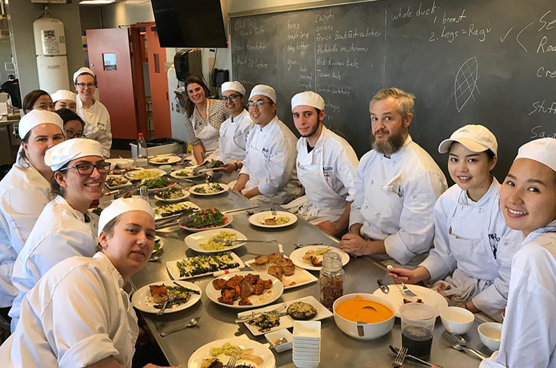 Students in Drexel's "Kitchen Garden" class. Photo courtesy of the Drexel Food and Hospitality Management Facebook page.