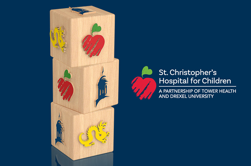 children's building blocks with Drexel, Tower Health and St. Christopher's logos