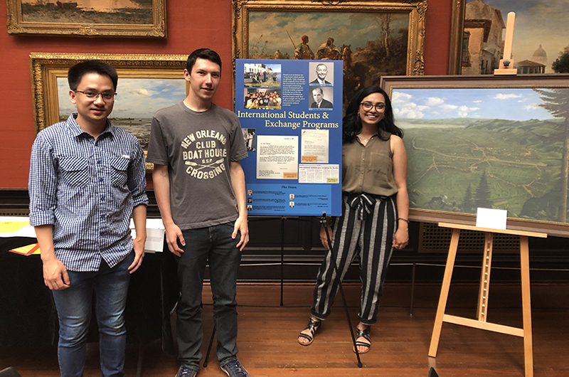 The poster and some of the students who investigated international students and exchanges at Drexel. 