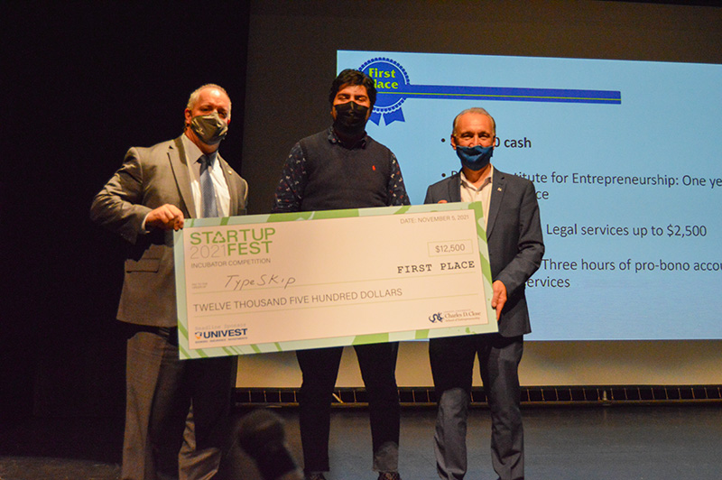 Basil Khan (center) convinced a panel of seasoned business leaders that his marketing app, TypeSkip, deserved to win a $12,500 prize, as well as a year-long residency at the Baiada Institute for Entrepreneurship, legal support from Morgan Lewis and accounting services from GMS Surgent. 
