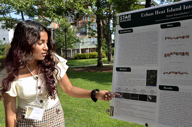 Avani Kavathekar presenting her work studying urban heat islands at the STAR Scholars Summer Showcase on Aug. 26 on Drexel's campus.
