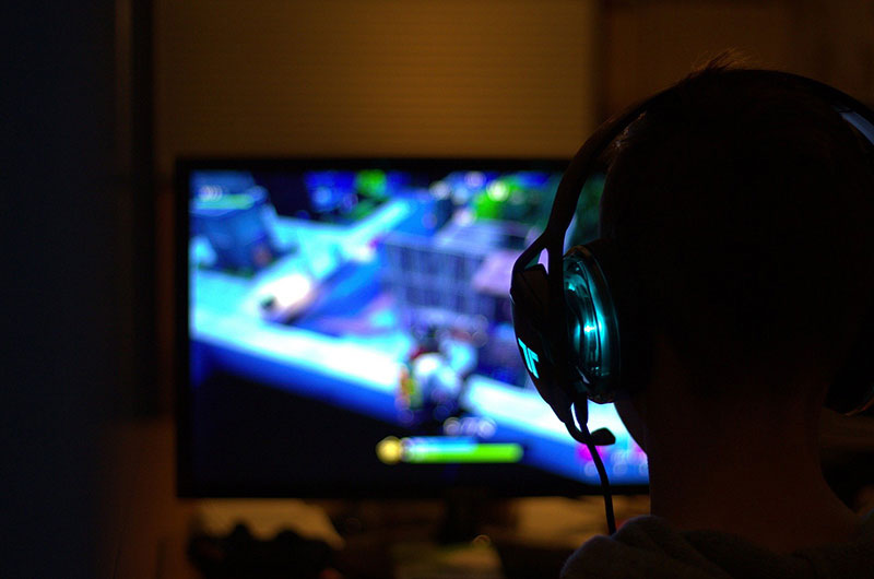Person playing a video game.