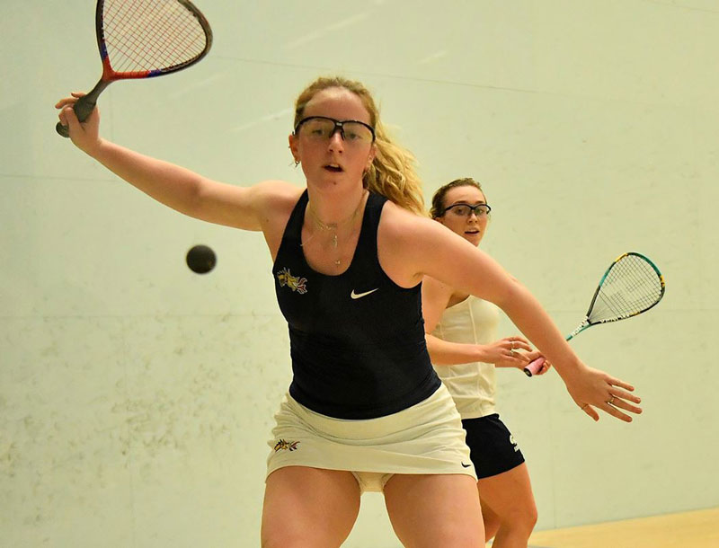 People playing racketball.