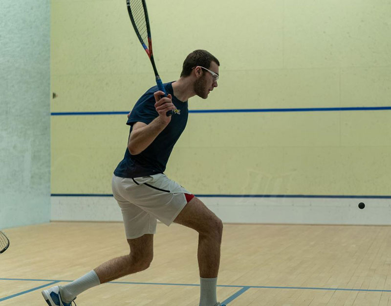 Person playing squash.
