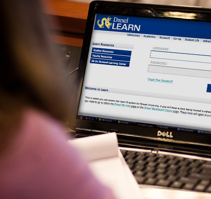 Person sitting at computer.