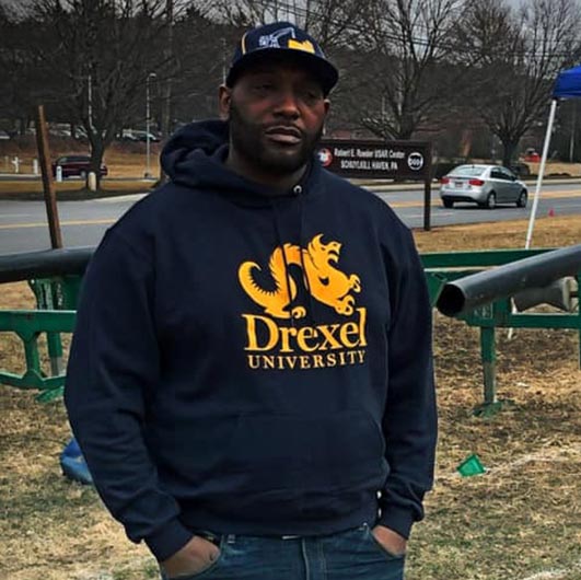 Person with a Drexel hoodie on