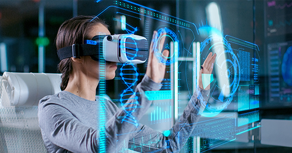 Female with Augmented reality goggles with her two hands touching the image a holographic image in front of her