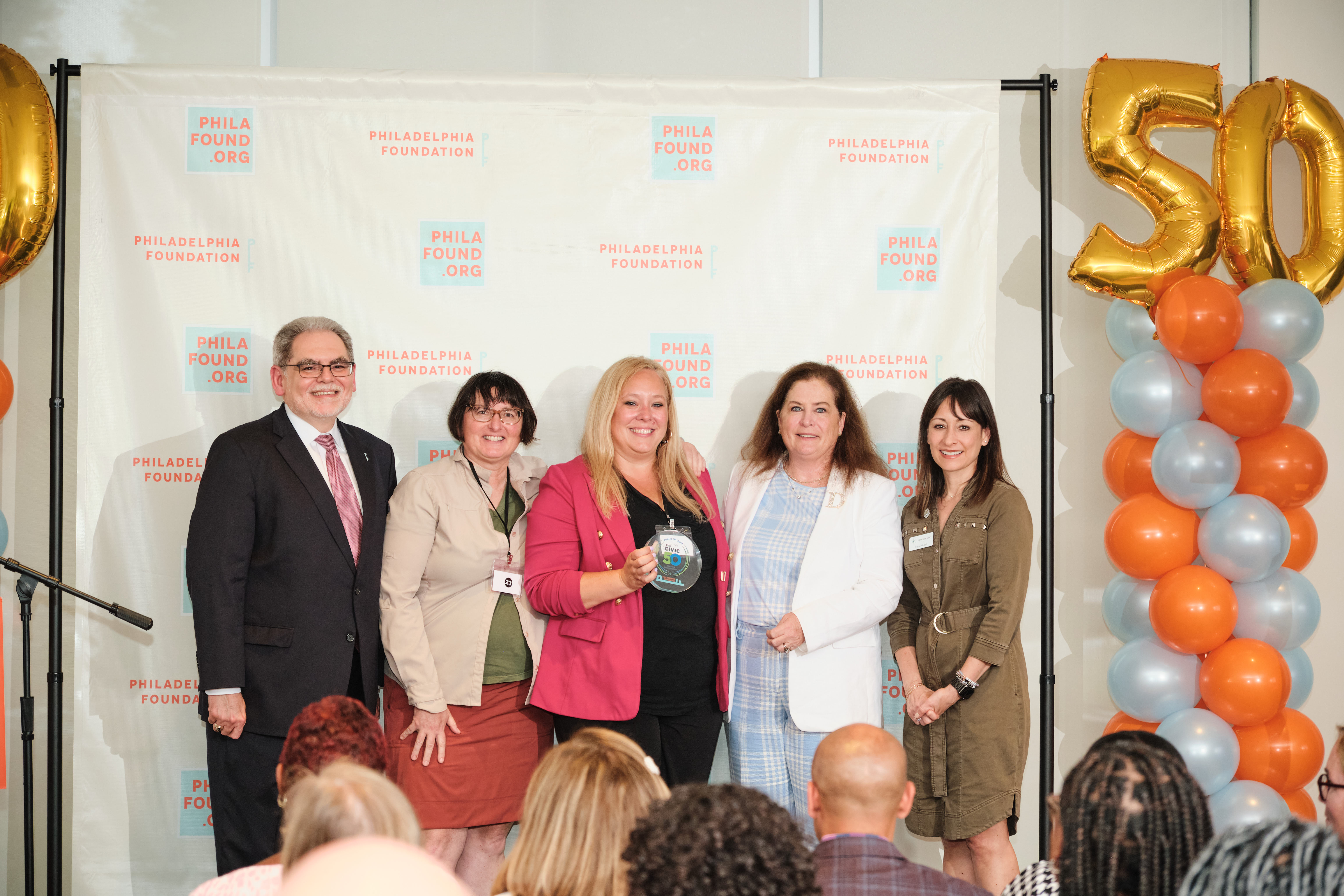 Jen Britton and Joanne Ferroni receiving formal recognition at FS Investment Corporate Headquarters