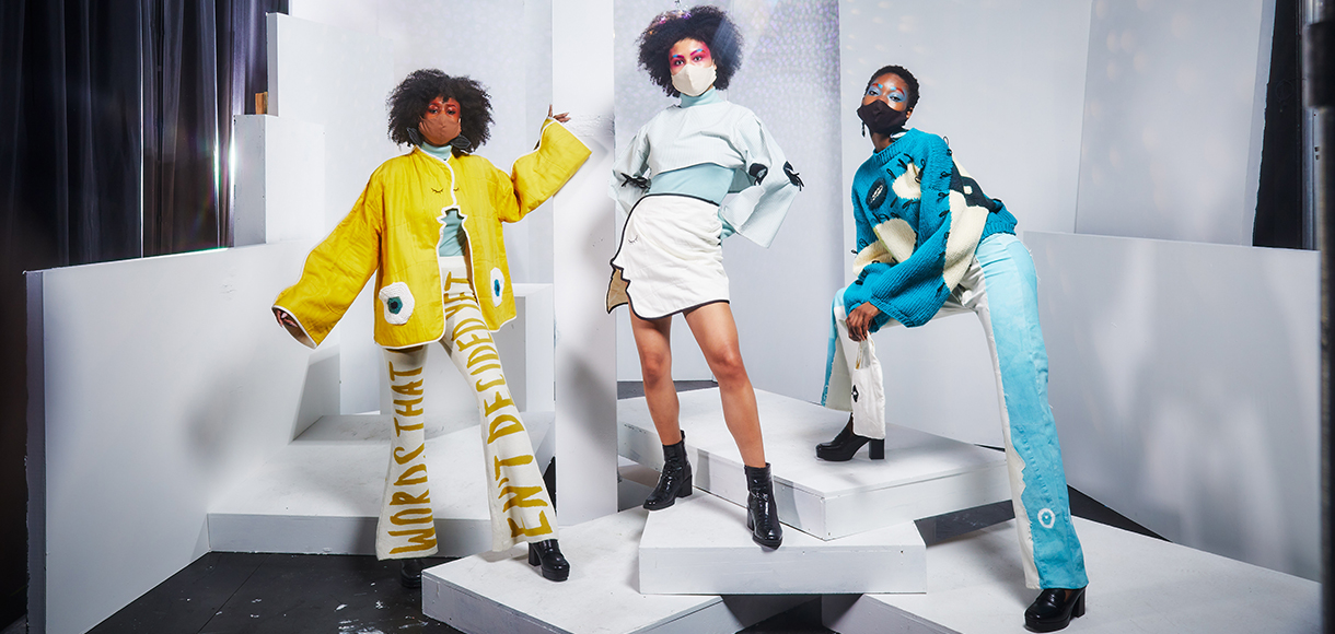 Three models showcasing senior fashion design collection