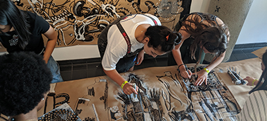 Students participating in a Studio Art Welcome Week event.