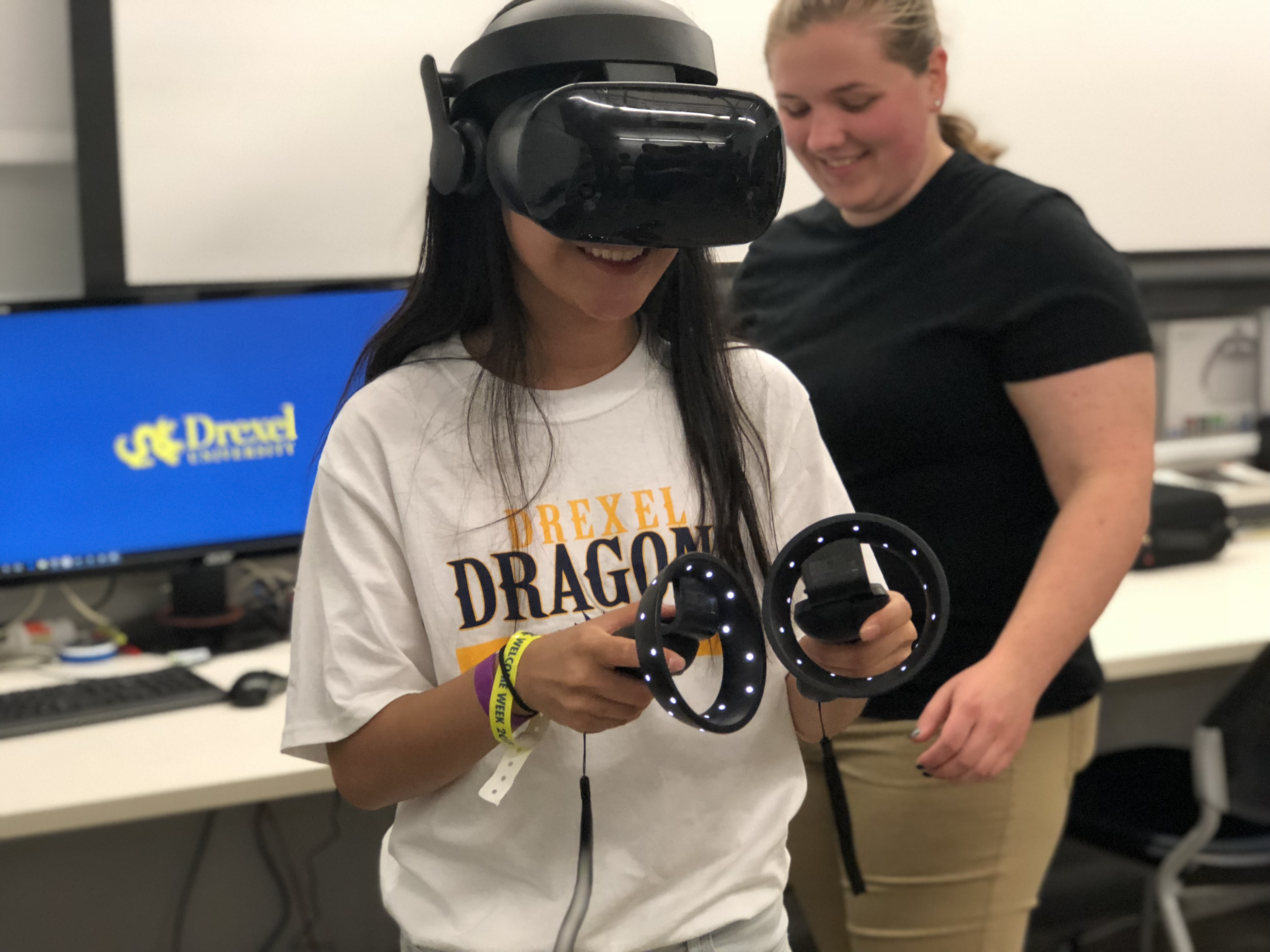 Young woman wearing virtual reality headset