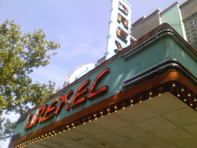 The facade of a movie theater with the word DREXEL