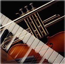 Image of piano and violin on black background