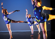 student dancers in blue