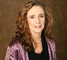 Photograph of Karen Curry in Purple Jacket