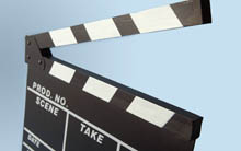 Image of a movie board on a blue background